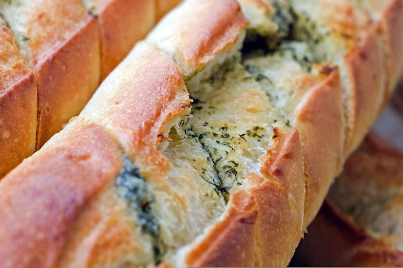 Crispy Garlic Bread with cheese and herbs appetizer