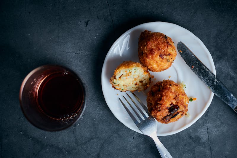 Arancini Italian rice balls fried with mozzarella