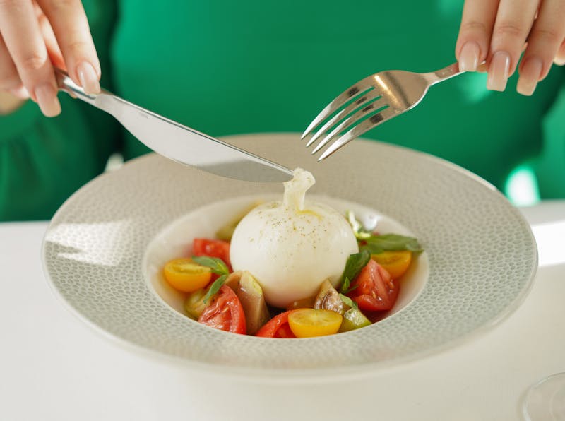 Burrata Caprese salad with tomato and fresh basil